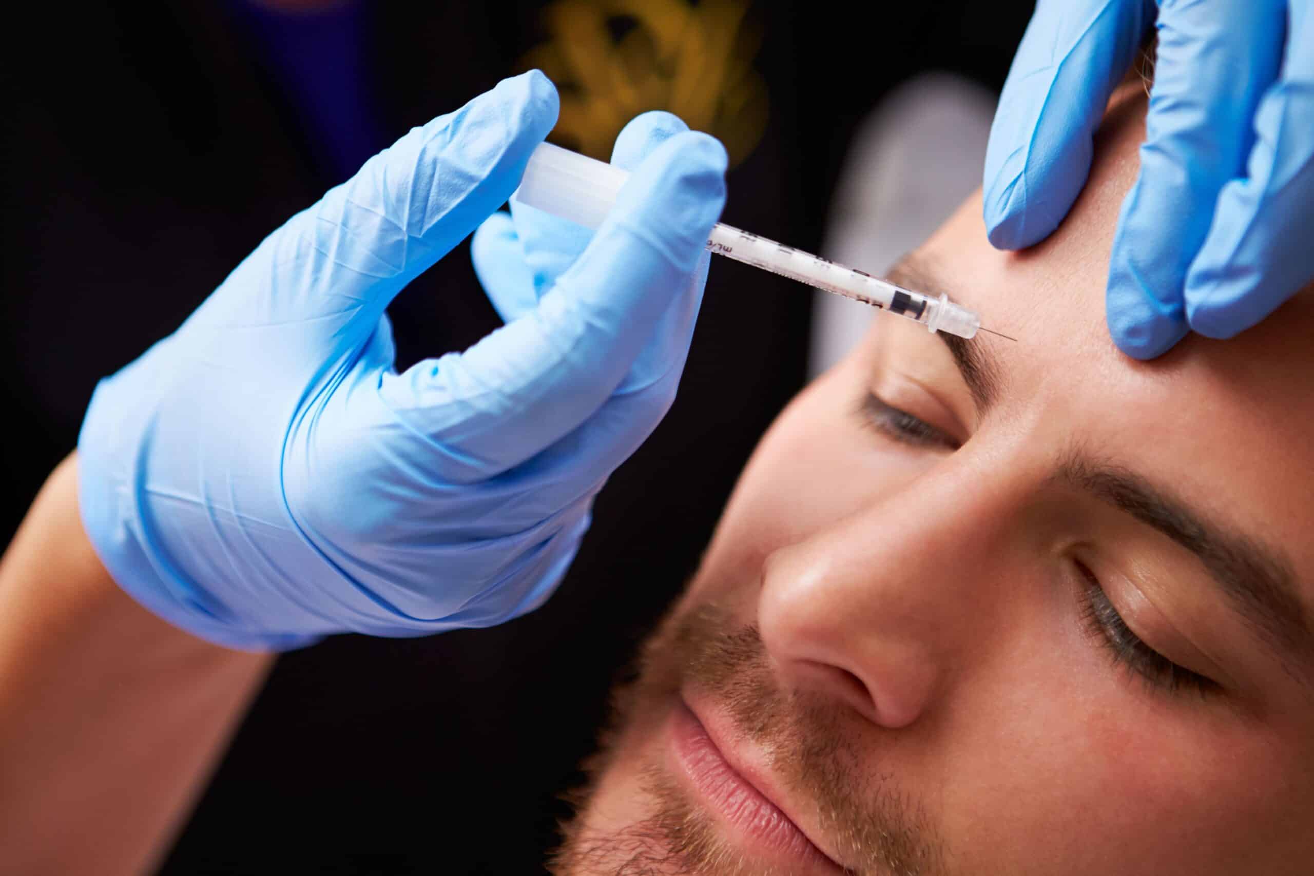 A Man getting an Injection on the forehead | Botox & Dysport in San Antonio, TX | My Best Face Forward Aesthetics