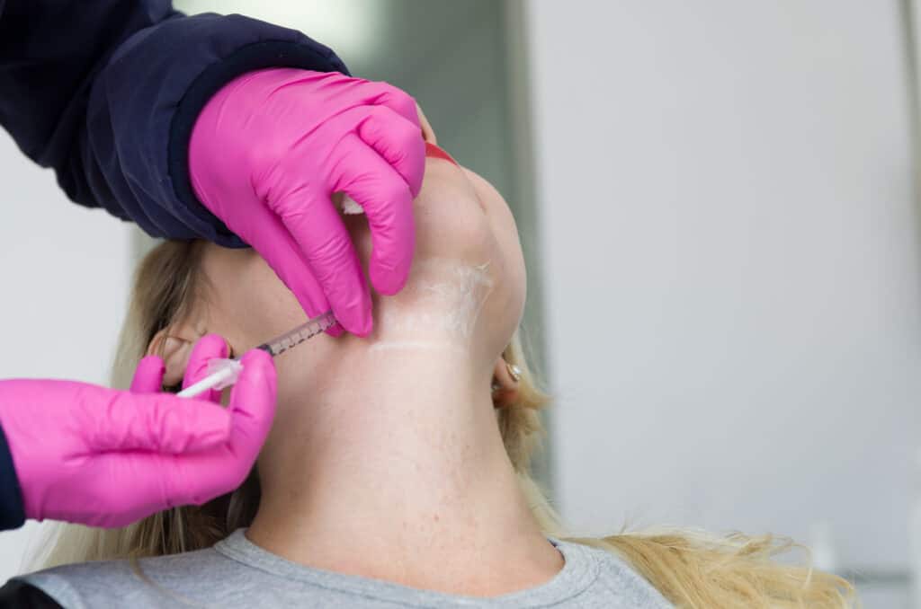 A Female getting treatment for double chin | Kybella San Antonio, TX | My Best Face Forward Aesthetics