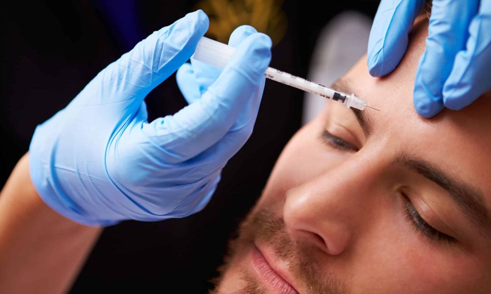 A Man getting an Injection on the forehead | Botox & Dysport in San Antonio, TX | My Best Face Forward Aesthetics